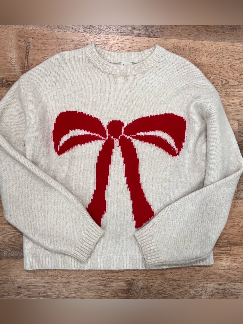 a new day Cream Crewneck Sweater with Red Bow Motif